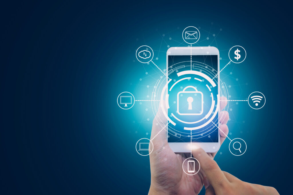 Hand Of Businessman Holding Smart Phone While Cyber Security Wit